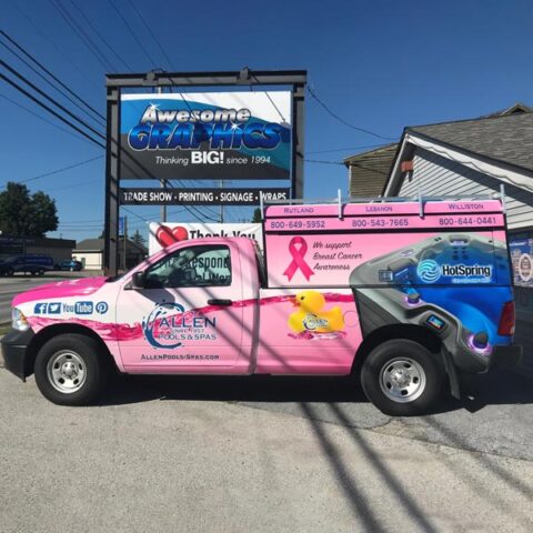 Awesome Graphics full vehicle wrapping in Rutland, Vermont, showcasing the brand on the road